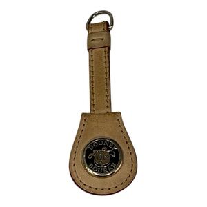 Vintage Dooney and Bourke Brass All Weather
Tan Leather Keychain Key Ring